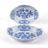 A pair of 19th Century Meissen reticulated dishes, in the 'Blue Onion' pattern, of oval form, the