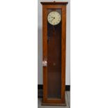 A Blick-Electric regulator-type wall clock, white dial with Arabic numerals, in an oak case,