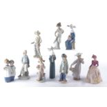 A small collection of Lladro Spanish porcelain figures and British Royal Doulton figures, the Lladro