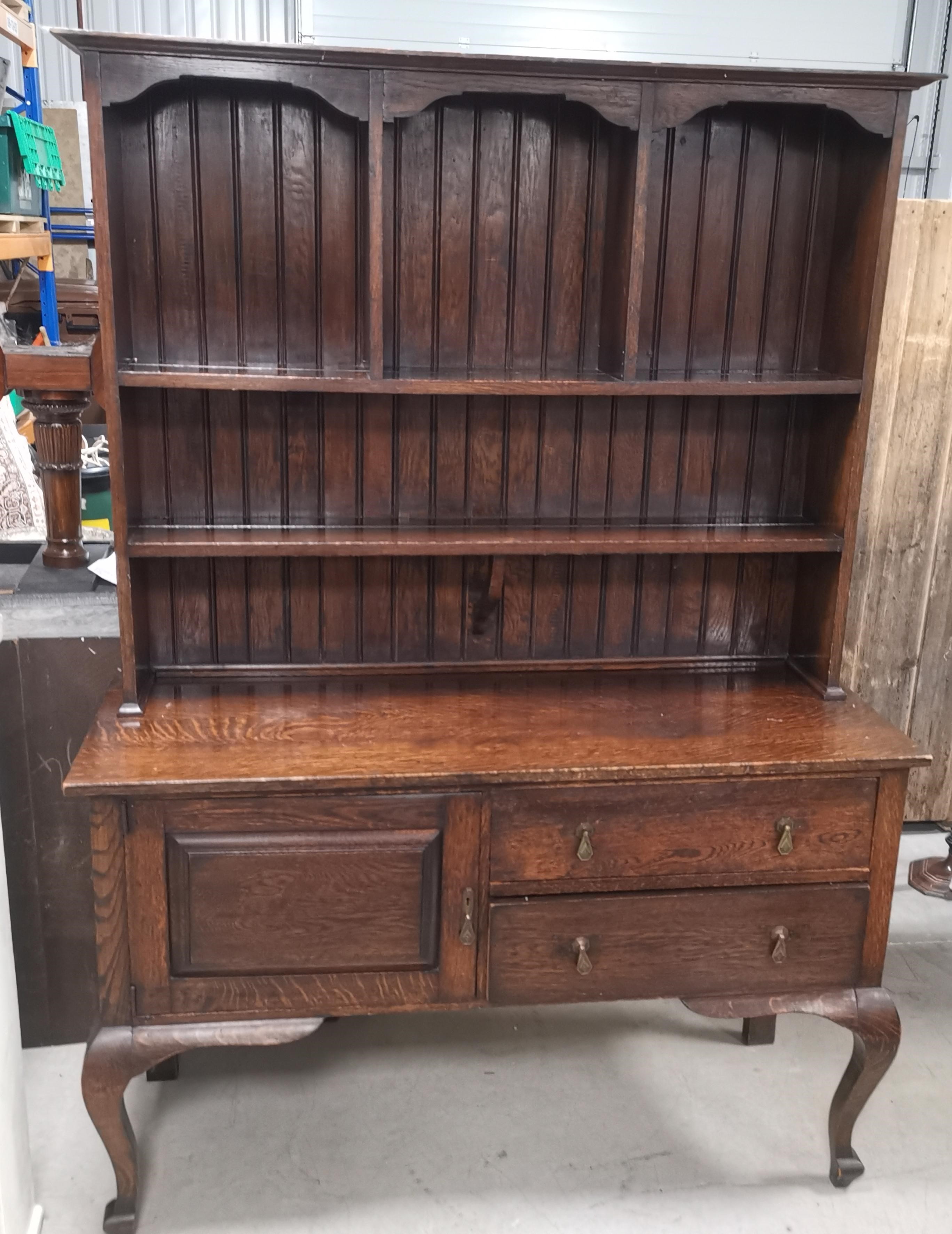 A 19th Century Oak dresser with two drawers and cupboard to base, 191cm x 140cm x 55cm