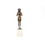 An Art Nouveau bronze figure by Eugene Wagner (1871-1942), depicting a young girl standing with a