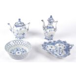 Four pieces of Royal Copenhagen porcelain in the onion pattern, one a trefoil shaped dish with a