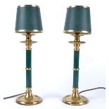 A pair of brass effect lamps with green central columns, sold for decorative purposes (2)