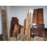 An extensive collection of planks, raw timber and spare furniture parts, to include oak, cherry,