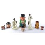 A small group of Toby and character jugs, to include a Burlington Ware watchman, height 24cm,