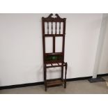 A mahogany hall stand with green tile inserts, 188cm x 56cm x 26cm