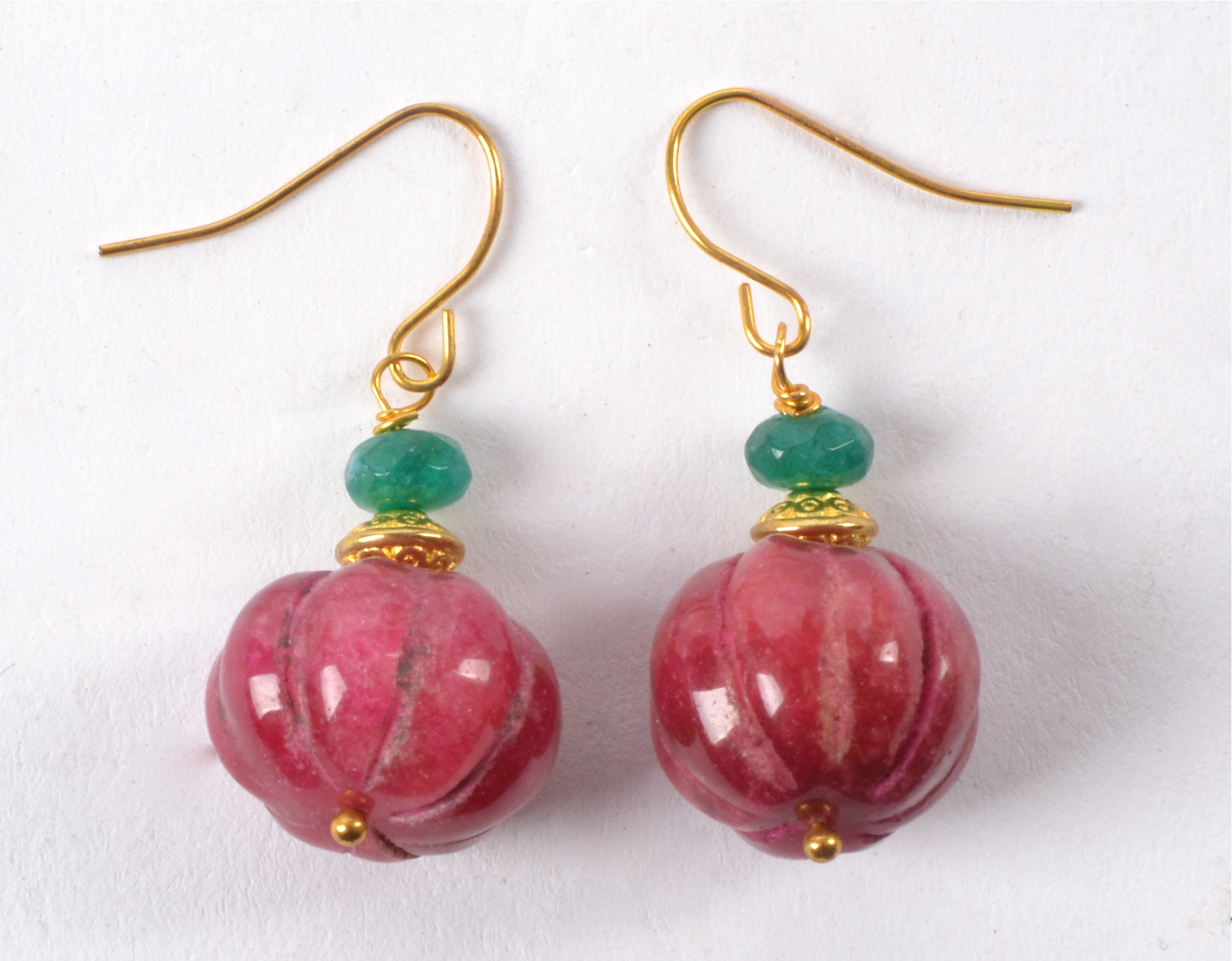 A pair of earrings with semi precious red stones similar to rubies, melon cut with mounted green - Image 2 of 3