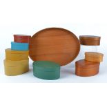 A quantity of natural and polychrome Shaker style boxes of oval form, each example hand crafted in