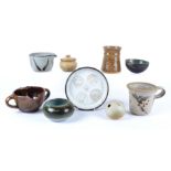 Ten pieces of 20th Century British studio pottery to include a half spherical bowl with a