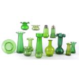 Various pieces of 19th Century and later green glass ware predominantly vases in varying shapes