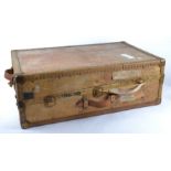 An Early 20th Century Antler travel trunk, vellum with brass fittings, stamped 'F.L.M.N.S.',