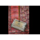 A Ewbank Royal Carpet sweeper, the oak veneered carpet sweeper with Ewbank Royal central crest