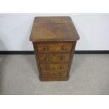 A 19th century burr walnut chest of narrow proportions, with two short drawers and one deep, moulded