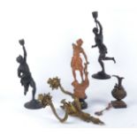 A pair of 19th Century mixed metal candlestick holders in the form of Blackamoors or Turks in the