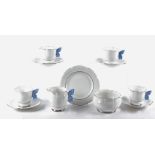 A 20th Century china tea set 'C W S Windsor China' with butterfly wing handles, consisting of