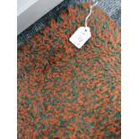 A mid Century woollen rectangular rug, with all over orange and emerald green pile throughout, 278cm
