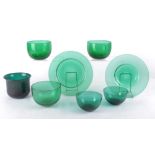 A set of six Georgian or later 19th Century coloured Bristol emerald green glass bowls, with a