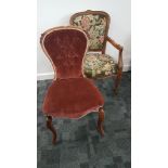 A continental fruitwood carved open armchair, with upholstered woolwork cushion seat and back with