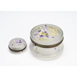 Two continental Art Nouveau glass dressing table jars and covers, both of cylindrical shape, one