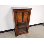 An Edwardian inlayed rosewood music cabinet with glazed door front, 98cm x 54cm x 35cm.