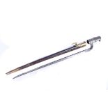 An 1853 socket bayonet, marked with crown and E6 to the blade, complete with an unmarked leather and