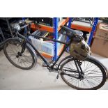 A war period sit up and beg bicycle, possibly BSA, in black, marked W2 serial 3985,with Lycetts