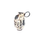 A WWII period Inert Mills Grenade, painted cream, marked WD to the front screw, complete with pin,