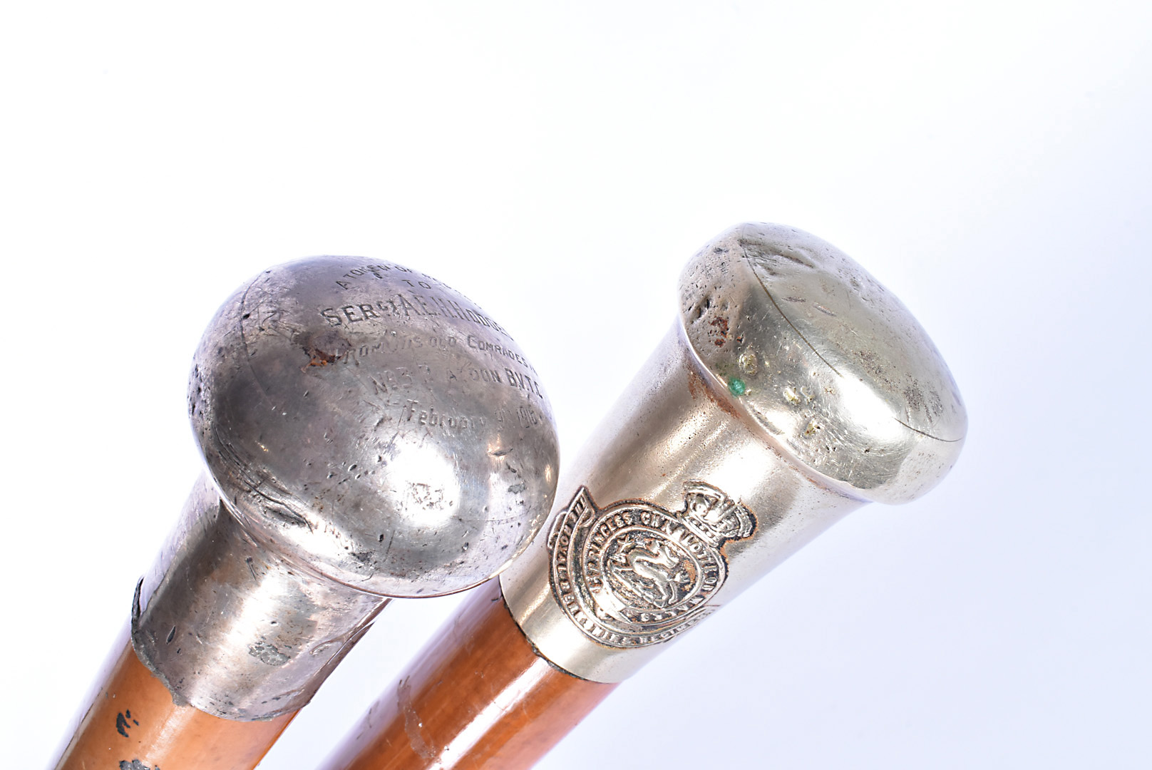 A silver topped parade stick, with inscription 'A token of regard to Sergt A E H Hodges from his old