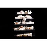 A collection of crested nautical models, including HMHS Anglia, RMS Lusitania, leisure craft, a