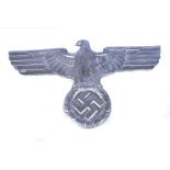 A solid lead Eagle and Swastika plaque, 62cm x 35cm, approx. 9.75kg please form own opinion of