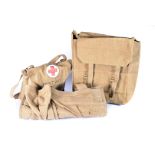 A complete WWII British First Aid kit, the canvas bag dated 1942, complete with unopened contents,