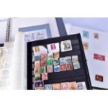 An extensive collection of British and World stamps, mainly modern, complete with a large collection
