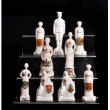 A collection of WWI crested china nurses, to include two Arcadian 'Soldier's Friend' bearing