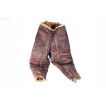 A pair of WWII RAF sheepskin flying trousers, braces and pocket have been removed, no obvious labels
