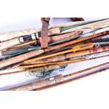 An assortment of fishing equipment, to include rods, reels and more, various makers and ages (