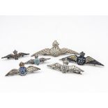 A small collection of silver Royal Air Force wing sweetheart brooches, including plain silver,