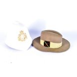 A 24th of the Foot white pith helmet, the helmet plate to the front being gilt metal, together