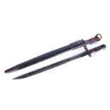 A US Remington 1917 bayonet and scabbard, marked to the single fullered blade, with leather and