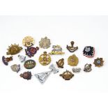 An array of military sweetheart brooches and Lepel pins, including Royal Armoured Corps, Military