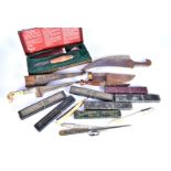 A selection of Middle Eastern knives, together with a selection of men's cut throat razors, and a