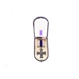 A George V unnamed Military Cross, in original purple and gilt presentation box