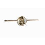 A 15ct and 9ct gold and mother of pearl Grenadier Guards sweetheart bar brooch, the 15ct mount