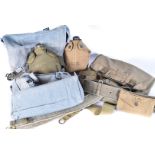 A selection of US military items, to include a 1942 bottle and cover, 1946 satchel, wedding and