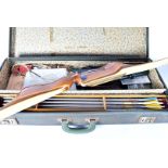 A 1980s Petron bow and arrow set, the wooden bow with makers name, complete with carry case,