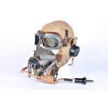 A First Pattern Type D helmet, together with a Type G oxygen mask and Mk VIII pilot goggles, user