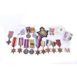 A collection of British WWI and over seas medals, full size and miniature, together with a Royal