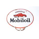 A Gargoyle Mobil oil double sided oval enamel cabinet pediment sign, bearing registered trade