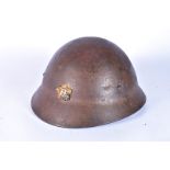 A Rare WWII Japanese Police Helmet, having badge to front, complete with original liner and chin