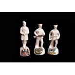 Three Arcadian China crested figures, comprising Tommy in Bayonet Attack (Berwick-on-Tweed), Tommy
