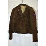 Four US Military jackets, one marked for Leonard L Hoover with his service number, in green, the